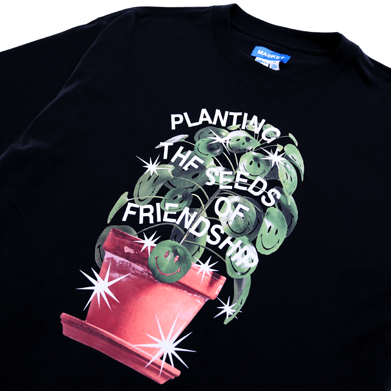 Smiley Seeds of Friendship Tee in black