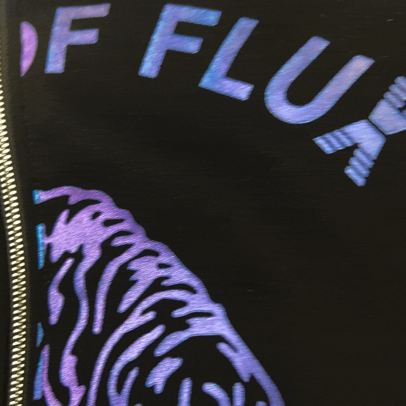 Allover Prowler Zip-up Hoodie in black and iridescent blue