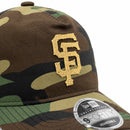 San Francisco Giants Field Notes Unstructured A-Frame 9Forty Snapback Hat in vintage washed camo with an embroidered gold SF logo on the front.