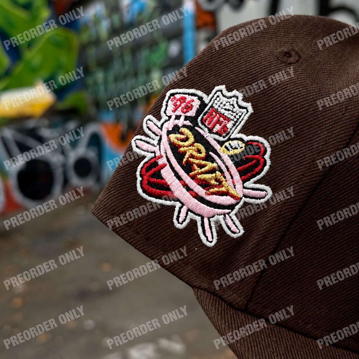 Fitted San Francisco 49ers T.O. Pinky hat in walnut with raised embroidered logo and metallic details. Pink underbill.