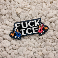 Eff Ice Climber 2-inch soft enamel pin with pixel artwork in white, blue, black, and pink