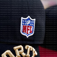 Close-up of the NFL patch on dark fabric with gold embroidery, showing the PREORDER ONLY San Francisco 49ers Golden Ticket V2 59Fifty Fitted Hat in black and cardinal; “PREORDER ONLY” text overlays the image.