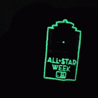 A glowing green outline of a sign reads ALL-STAR WEEK with an MLB logo below, set against a black background—an image that would look right at home on the San Francisco Giants All-Star Trolley Corduroy 19Twenty Snapback Hat in black and orange.