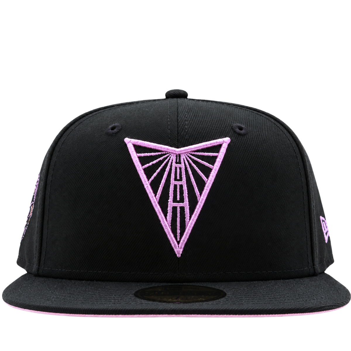 A black and violet Golden State Valkyries 59Fifty V’s Up After Dark Fitted Hat featuring a pink embroidered Golden Gate Bridge triangle logo on the front, released as a State Of Flux exclusive.