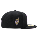 A black Golden State Valkyries 59Fifty V’s Up After Dark Fitted Hat in black and violet featuring an embroidered gold knight holding a sword on the side panel.