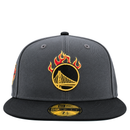 Golden State Warriors On Fire 59Fifty Fitted Hat in graphite and black, a dark grey cap with a black brim and an NBA Jam inspired Warriors logo topped with red and yellow flames.