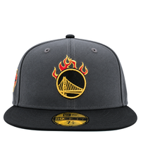 Golden State Warriors On Fire 59Fifty Fitted Hat in graphite and black, a dark grey cap with a black brim and an NBA Jam inspired Warriors logo topped with red and yellow flames.