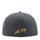 Graphite and black Golden State Warriors On Fire 59Fifty Fitted Hat featuring The City embroidered in yellow script on the front.