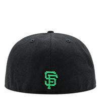 Black San Francisco Giants Burnin’ Green 59Fifty Fitted Hat with an embroidered green SF logo on the front.