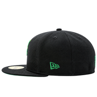 Black San Francisco Giants Burnin’ Green 59Fifty Fitted Hat with a green embroidered logo on the side and a green underside of the brim.