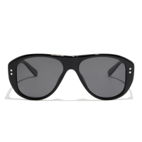 Austin Sunglasses in elysium double black and ink polarized are oversized black aviator sunglasses with star-shaped silver accents on the temples and dark polarized lenses.