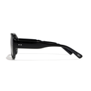 Side profile of oversized black Austin Sunglasses in elysium double black and ink polarized, featuring two small star icons on the temple.