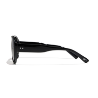 Side profile of oversized black Austin Sunglasses in elysium double black and ink polarized, featuring two small star icons on the temple.