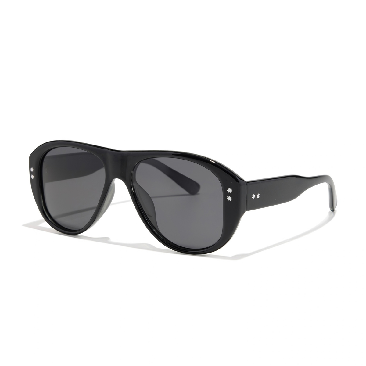 Austin Sunglasses in elysium double black and ink polarized, featuring oversized black aviator frames with dark, polarized lenses and small decorative studs.
