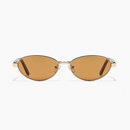 Cherry Sunglasses in polished gold and hazelnut, featuring an oval gold metal frame with light brown lenses.