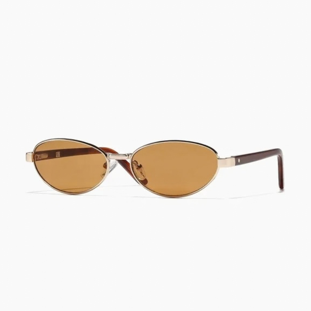 Cherry Sunglasses in polished gold and hazelnut, featuring an oval shape with a gold metal frame and brown lenses.