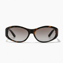 Brooks Sunglasses in tigers eye and dune, featuring an oval shape with a sustainable polycarbonate frame and gradient lenses.