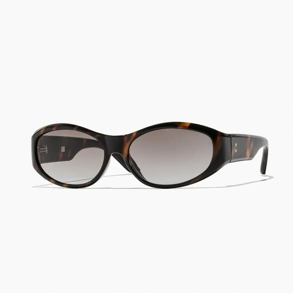 Brooks Sunglasses in tigers eye and dune, featuring oval frames and gradient lenses.