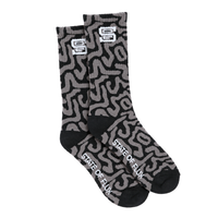 SOF Mindstate Crew Socks in grey and black featuring a Mindstate pattern, a white square logo on the cuff, and STATE OF FLUX printed on the foot.