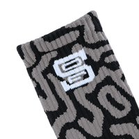 SOF Mindstate Crew Socks in grey and black featuring a repeating abstract Mindstate pattern and a white State Of Flux graphic logo.