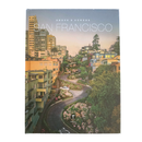 Above and Across San Francisco hardcover photo book showing aerial view of Golden Gate Bridge city grid and the Bay