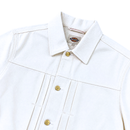 The Selvedge Pleated Denim Jacket in white features gold buttons, a classic collar, visible stitching, and a small logo tag inside the collar.