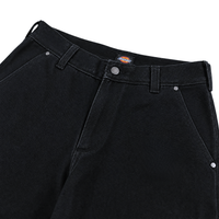 Close-up of Double Knee Canvas Shorts in black, featuring a classic five-pocket design, visible belt loops, and a small Dickies logo tag on the waistband—an iconic detail found on other signature Dickies workwear.