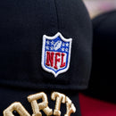 Close-up of the PREORDER ONLY San Francisco 49ers Golden Ticket V2 59Fifty Fitted Hat in black and cardinal, featuring an NFL logo and partial gold PARTY lettering—a must-have for any fitted hat collector.