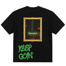 The Keep Goin' Tee in black is a heavyweight cotton shirt featuring a framed photo of San Francisco’s neon-lit New Mission theater on the back, with bold green “KEEP GOIN’” graffiti text underneath.