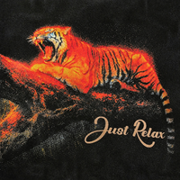 The Just Relax Tee in mineral black features a vivid tiger illustration on a branch against a dark background, printed on heavyweight cotton with "Just Relax" elegantly scripted at the bottom right.