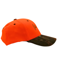 The Peep Game Hat in safety orange features a brown Mossy Oak camo-patterned brim and a small embroidered front logo, shown from a side angle on a white background.