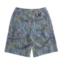 The Love For Life Shorts in camo are knee-length streetwear shorts with a green, brown, and gray camouflage print, featuring an elastic waistband and a single back pocket.
