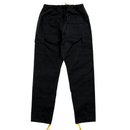 The Flux Utility Cargo Pants in black are shown from the back, featuring two back pockets, side utility pockets, an adjustable waistband, and yellow drawstrings at the ankles.