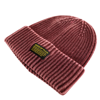 A ribbed knit Mantra Beanie in washed burgundy with a folded brim, featuring a black and yellow State of Flux patch on the front. Crafted from a soft rayon blend for extra comfort, this versatile accessory combines style and warmth.