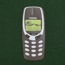 Illustration of a vintage mobile phone with STATE OF FLUX on the screen, and the words embrace uncertainty beneath it, set against a dark green background. Printed on the Answer The Call Tee in forest green—a heavyweight oversized t-shirt crafted from 100% cotton—this design is perfect for streetwear layering.