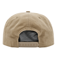 Showcased from the back, the San Francisco 49ers Big Logo Visor 9Fifty Snapback Hat in beige features an adjustable snapback closure and two small ventilation holes on each side. Ideal for fans and collectors, this vintage-inspired cap displays a gray inner lining partially visible through the opening, perfectly blending classic style with bold team pride.