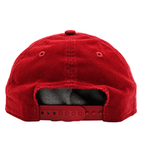 The image displays the back of the San Francisco 49ers Super Bowl XXIV Embossed 9Forty A-Frame Snapback Hat in scarlet corduroy, featuring an adjustable snapback closure and two small ventilation eyelets.