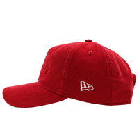 The San Francisco 49ers Super Bowl XXIV Embossed 9FORTY A-Frame Snapback Hat in scarlet corduroy is displayed in profile, highlighting its visible stitching and a white embroidered side logo that evokes the signature New Era 9FORTY A-Frame style.