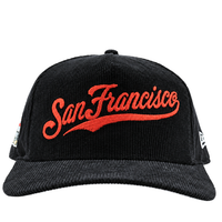 Here’s a rewritten sentence incorporating the product data: The San Francisco Giants All-Star Trolley Corduroy 19Twenty Snapback Hat features black corduroy with “San Francisco” embroidered in red cursive chainstitch on the front, complemented by white logos on the sides for a classic ballcap look. The hat is presented against a white background, showcasing its black and orange colorway.