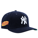 Introducing the New York Yankees Seinfeld Corduroy 59Fifty Fitted Hat in navy and white—a stylish corduroy baseball cap featuring a classic white NY logo on the front and a vibrant yellow and red Seinfeld patch on the side, blending iconic team spirit with playful nostalgia.
