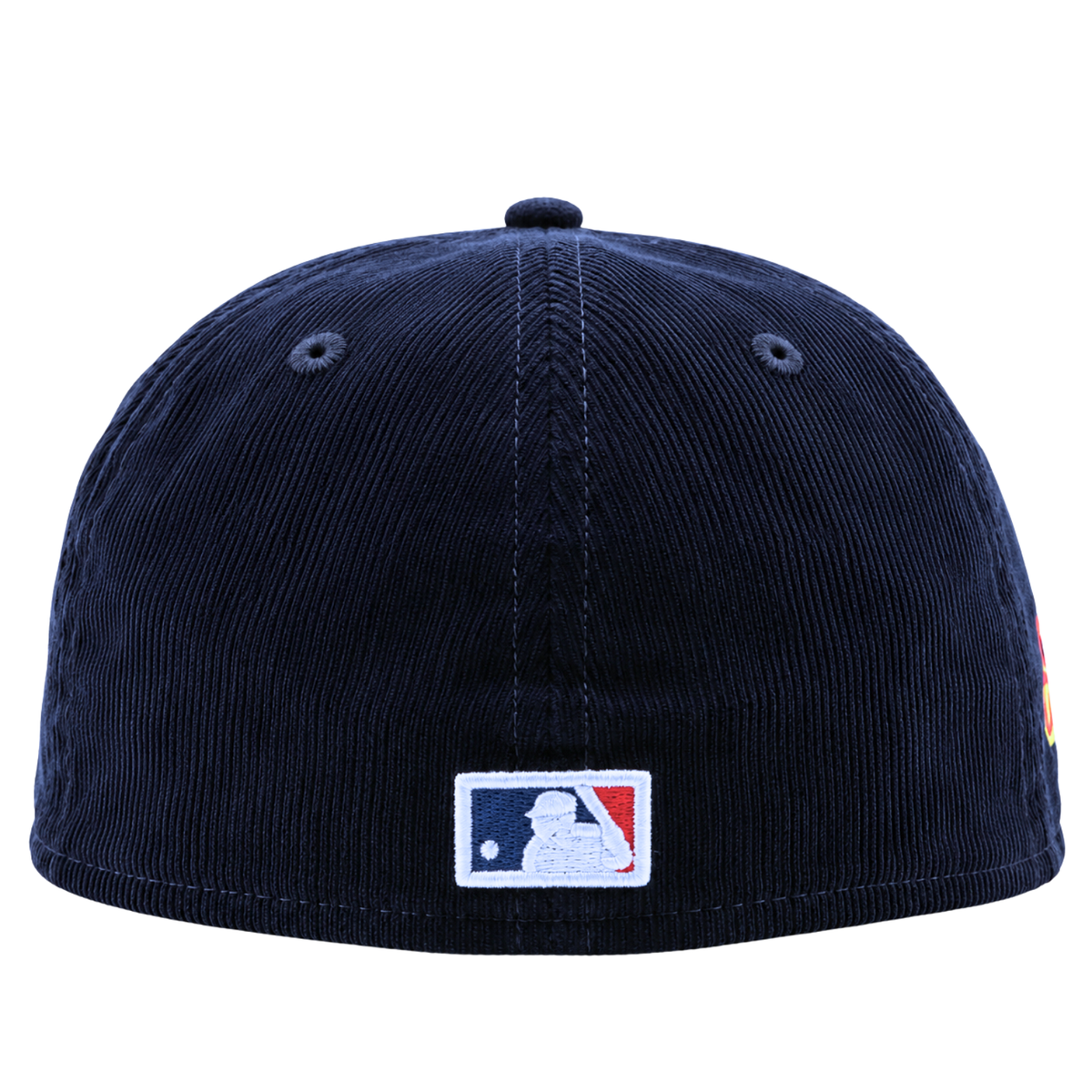 A New York Yankees Seinfeld Corduroy 59Fifty Fitted Hat in navy and white, shown from the back, features the MLB logo patch centered near the bottom edge. This classic design evokes a timeless style that fans of both Yankees fitted hats and Seinfeld New Era caps will recognize and appreciate.