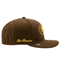 Walnut and metallic gold San Francisco 49ers Gold Standard 59Fifty Fitted Hat with an embroidered gold team logo on the side and San Francisco in gold cursive script above the brim.