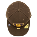 Top-down view of a San Francisco 49ers Gold Standard 59Fifty Fitted Hat in walnut and metallic gold, featuring a metallic gold logo on the front panel and a gold text emblem on the brim.