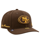 San Francisco 49ers Gold Standard 59Fifty Fitted Hat in walnut and metallic gold, featuring a gold embroidered logo on the front, cursive side text, and a metallic gold brim plate.