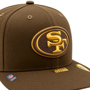 Walnut and metallic gold San Francisco 49ers Gold Standard 59Fifty Fitted Hat with a metallic gold logo on the front, a gold metal tab on the brim, and an NFL shield patch on the side.