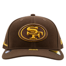 San Francisco 49ers Gold Standard 59Fifty Fitted Hat in walnut and metallic gold, a brown New Era 59FIFTY fitted baseball cap featuring a metallic gold embroidered team logo on the front.
