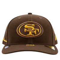 San Francisco 49ers Gold Standard 59Fifty Fitted Hat in walnut and metallic gold, a brown New Era 59FIFTY fitted baseball cap featuring a metallic gold embroidered team logo on the front.