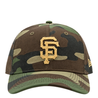 San Francisco Giants Field Notes Unstructured A-Frame 9Forty Snapback Hat in vintage washed camo with an embroidered gold San Francisco Giants logo on the front.