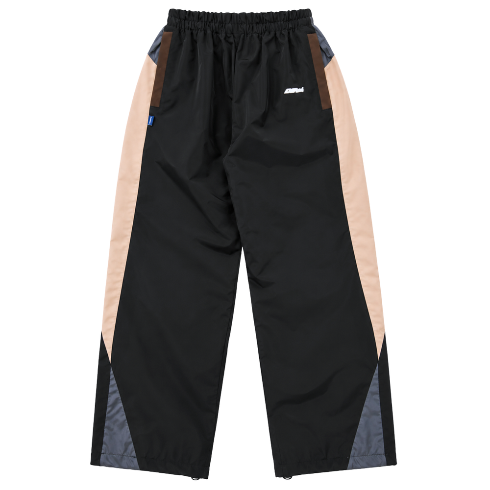 Disorder Track Pants in black and beige