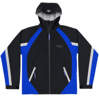 Aegis Shell Jacket in black and royal blue - Devá States - State Of Flux